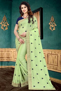 Graceful Green Georgette Border Work Saree With Brocade Blouse