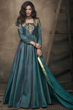 Desirable Turquoise Silk Embroidered Party Wear Gown