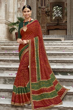 Graceful Maroon Georgette Embroidered Party Wear Saree