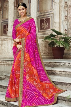 Desirable Orange and Pink Georgette Embroidered Party Wear Saree