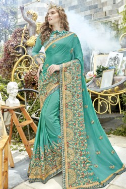 Admirable Turquoise Georgette Embroidered Saree With Banglori Silk Blouse