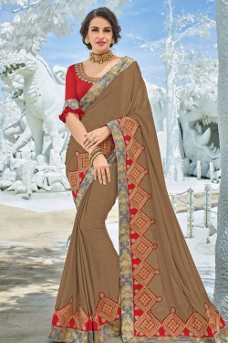 Stylish Beige Georgette Embroidered Party Wear Saree With Silk Blouse