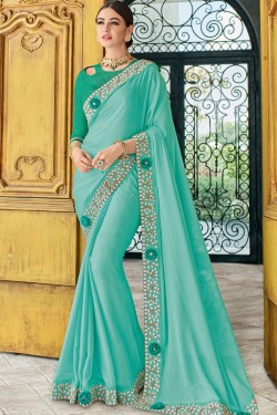 Gorgeous Turquoise Georgette Embroidered Party Wear Saree With Silk Blouse