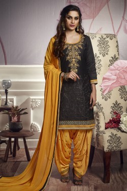 Desirable Black Cotton and Satin Embroidered Designer Patiala Salwar Suit With Nazmin Dupatta
