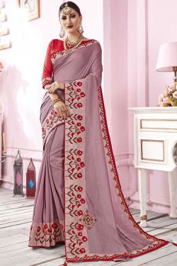 Desirable Purple Satin and Georgette Embroidered Saree With Banglori Silk Blouse