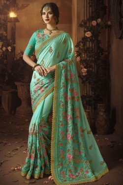 Pretty Turquoise Silk Embroidered Saree With Silk Blouse