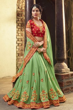 Optimum Green Crepe and Silk Embroidered Saree With Dhupion Blouse