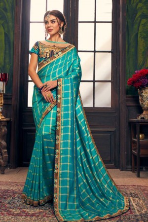 Lovely Turquoise Silk Border Work Saree With Silk Blouse