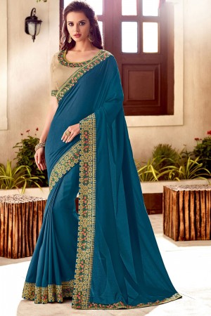 Excellent Teal Silk Embroidered Saree