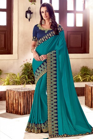 Pretty Turquoise Net Embroidered Saree