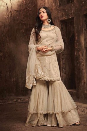Sonal Chauhan Gorgeous Beige Net Party Wear Designer Sharara Plazo Salwar Suit