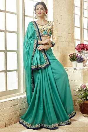 Lovely Turquoise Fancy Fabric Embroidered Saree With Fancy Fabric Blouse