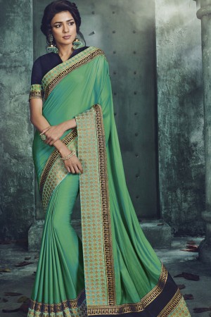 Graceful Turquoise Fancy Fabric Jaquard Work Designer Saree