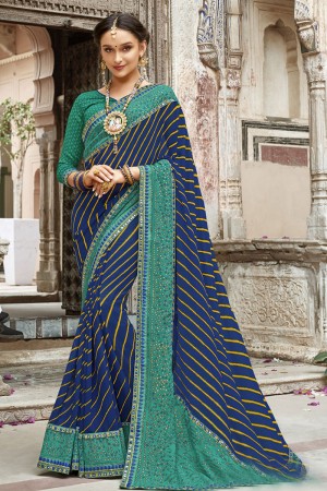 Desirable Blue Georgette Embroidered Party Wear Saree
