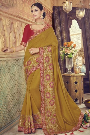 Desirable Mehendi Green Silk Embroidered Saree With Banglori Silk Blouse