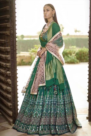 Excellent Green Silk Embroidered Lehenga Choli with Net Dupatta