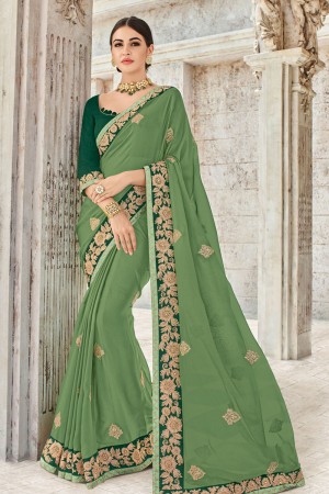 Stylish Green Georgette Embroidered Party Wear Saree With Silk Blouse