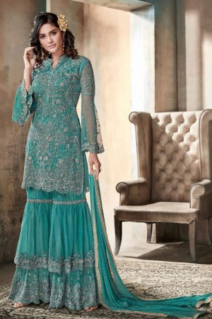 Lovely Turquoise Net Embroidered Salwar Suit With Nazmin and Chiffon Dupatta