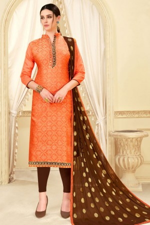 Charming Orange Banarasi Silk Jaquard Work Casual Plazo Salwar Suit With Nazmin Dupatta
