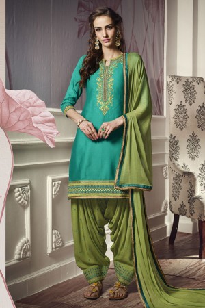 Charming Turquoise Cotton and Satin Embroidered Designer Patiala Salwar Suit With Nazmin Dupatta