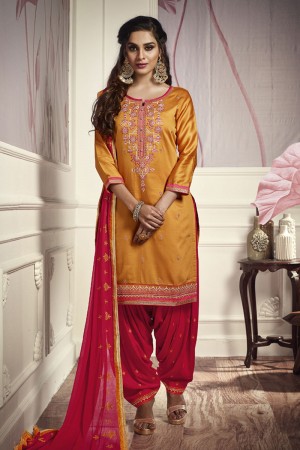 Graceful Mustard Cotton and Satin Embroidered Designer Patiala Salwar Suit With Nazmin Dupatta