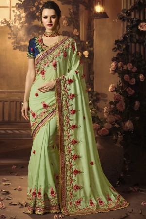 Ultimate Green Georgette Embroidered Saree With Silk Blouse