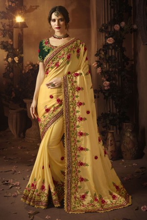 Stylish Yellow Georgette Embroidered Saree With Silk Blouse