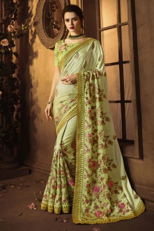 Desirable Green Silk Embroidered Saree With Silk Blouse