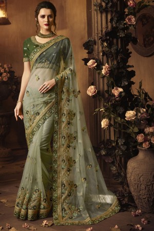 Beautiful Green Net Embroidered Saree With Silk Blouse