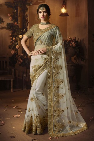 Admirable Off White Net Embroidered Saree With Silk Blouse