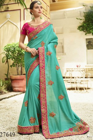 Charming Turquoise Silk Embroidered Saree With Silk Blouse