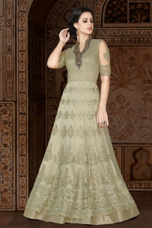 Lovely Beige Embroidery Worked Salwars Suit with Net Dupatta